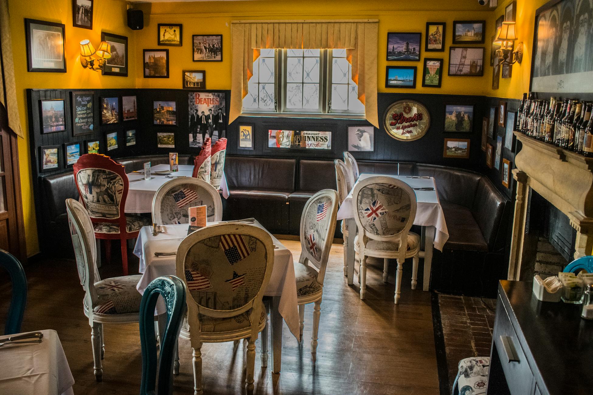 Warm and inviting vintage-themed bistro interior with eclectic decor.